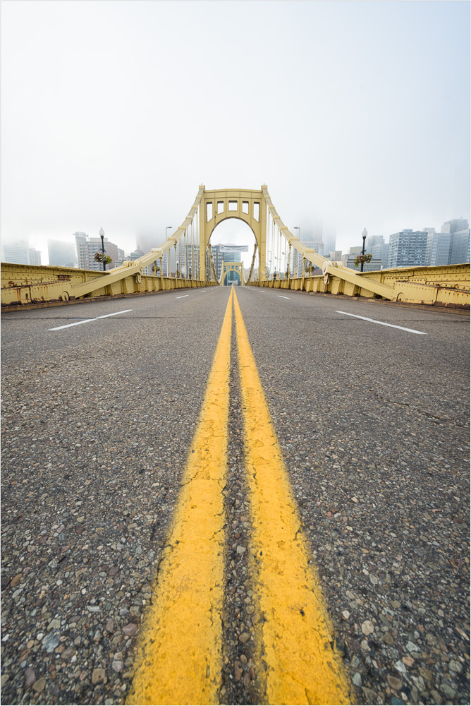 Bridge-To-A-Fog-Filled-City.jpg