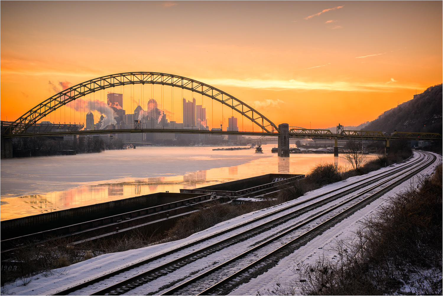 Icy-Rivers-And-Snowy-Tracks.jpg